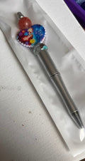 Hot pink Mario beaded pen with character figure topper